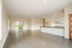  2/122 Maroondah Highway Healesville VIC 3777 $470,000-$480,000 New Open Plan with Ensuite Take advantage of this opportunity to buy a brand new spacious 3 bedroom townhouse with ensuite set at the rear of a 2 lot subdivision handy to shops and transport. The large open plan tiled living space has plenty of room for a large lounge suite and dining table. The kitchen features lots of bench space, gas cooktop, electric oven and dishwasher. Natural gas ducted heating, double carport, and water tank linked to toilets and laundry are also included. Brand new - and just for you! Price Guide: $470,000-$480,000   |  Type: House  |  ID #535684 