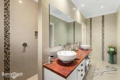  12 Reservoir Cres Rowville VIC 3178 $980,000 For the Most Discerning Buyer â Panoramic Views Architect designed and built, this home offers uninterrupted views from the living areas and elevated balcony/entertaining area, where relaxed evenings see the sunset recede and the lights flicker through a canopy of distance trees towards Waverley. The home is exquisitely finished in every respect and offers one level living with a downstairs studio, office and 6 car garage plus storage and workshop. Each detail in the home brings with it careful and thoughtful interior design, including a magnificent. Bespoke kitchen, Butler's Pantry, double ovens and refined finishes. The vast, rich granite bench is ideal for food preparation and entertaining. Natural light floods both levels of the home. For convenience, a laundry chute delivers apparel to the lower level, fully fitted laundry and alternate, zoned heating and cooling options throughout make for year round comfort. The Studio and Office have external doors and would also suit extended family living or home business. Hot and cold plumbing is connected on this level and the finishes are of the same premier standard. Nothing has been compromised. Landscaping is designed for low maintenance and year round beauty. A huge solar power system reduces electricity accounts to near zero. Quite exceptional â?? ideal for those with discerning taste and an appreciation of high end quality. Approx. 5 years old and 50 squares, plus with 3 phase power. Features Study Air Conditioning Built-In Robes 