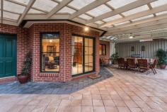  14 Redden Court,  Rostrevor SA 5073 Auction Date: Saturday 5 Nov 10:30 AM (On site) Open Home Dates: Tuesday 25 Oct 12:30 PM - 1:00 PM Tuesday 25 Oct 5:30 PM - 6:00 PM This is the one you've been waiting for ... with beautiful street appeal showcasing reproduction character of days gone by, this big comfortable family home superbly combines charm and personality with modern day luxury in an exclusive location surrounded by equally impressive homes. This immaculately presented one owner home is perfect for the buyer wanting the indoor space without the outdoor burden of a massive block, set on a manageable 542sqm amongst glorious gardens and extensive outdoor entertaining spaces. Desirable interiors ... downstairs - inviting entry hall with under stair storage room - warm and cosy formal sitting room with gas fire place connected to the formal dining room ideal to host dinner parties and Christmas lunch! - stunning solid Blackwood timber kitchen enjoying a corner pantry, wall oven, gas cook top and dishwasher of course  - adjacent open plan family room and casual meals well connected to the rear patio - powder room and laundry with storage cupboards - double auto garage with secure internal entry, drive thru door (handy for extra parking) and there's even a washing line in the garage so you won't need a dryer! ... upstairs - huge master suite with walk in robe and ensuite bathroom - 3 additional double bedrooms, 2 with built in robes - living space for upstairs fun - family bathroom with corner spa and separate shower - balcony to enjoy tree top views and refreshing gully breezes with a glass of wine or two - linen cupboard The great outdoors ... - classic federation facade with feature bluestone and lead light entry - stunning Tessellated entry porch - paved pergola with ceiling fan for any weather outdoor entertaining - lush low maintenance gardens and lawns, a riot of seasonal colour and fully irrigated so you can set and forget - garden/tool shed - relaxing water feature to enhance the tranquil location with resident koalas and abundant birdlife  