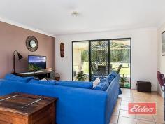  99 Pastoral Ct Jimboomba QLD 4280 5 Bedrooms, 2 Bathrooms, 1 Acre ! Enjoying a quiet cul de sac position here on this lush green and level 1 acre, with bush reserve on the back boundary, your inspection will reveal a bright and inviting family home with a very flexible floor plan and the peace of mind that comes only with steel frame construction. Your family will enjoy 4 well sized bedrooms plus a 5th bedroom or Study, depending on your needs – it’s a well sized room so plenty of space for a free standing robe if required, some of which have triple rather than double built-ins.  The master bedroom is set well away from the rest (at the opposite side of the house in fact) and in addition to a particularly nice outlook over the back yard, also features a walk through robe to the en-suite beyond.  The open plan living areas, offer a well sized dining, separate lounge and separate family / meals areas, all of which connect easily to the central kitchen, which offers abundant bench, storage and fridge space as our images clearly show. Moving outside, the whole family will enjoy the large outdoor entertainment area, which features a fully insulated pitched roof – a great place to kick back and relax in comfort while you watch the kids run around the back yard and burn off some energy. The shed is similarly good news, being 9m x 7.5m with a 6m x 7.5m car port to the front – so that’s a covered area of 15m x 7.5m in total, with room for even more shed space if required and it comes complete with its own rain water tank. In addition you’ll also find a single and a double garden shed out there as well, both correctly setup on concrete bases. If solar power is on your shopping list then you’re in luck – we have a 3kW system here, which catches full sun thanks to the absence of any overhanging trees. It’s also discretely positioned to be largely hidden from the street view. So if you have been looking for a well presented, very family friendly home with a great yard, then this is definitely a must see property which just gets better when you consider the steel frame construction, the quiet cul de sac location and the bush reserve backdrop. How good is this ! Property Details Elders Property ID: 9387508 5 bedrooms 2 bathrooms 4 car parks Land Area 4028 square metres 4 car garage 