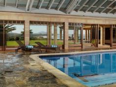  1320 Nanarup Road, Albany WA 6330 $20,000,000 MAITRAYA: A World Class Private Estate and Business Description  Overlooking Nanarup Beach and the Southern Ocean, Maitraya is situated 20 minutes from Albany in the Great Southern region of Western Australia. Maitraya, 'Place of Loving Kindness', is a sanctuary spanning 550 acres of pristine land, which offers privacy, functionality and abundant natural beauty. In addition to being a magnificent home, Maitraya is run as a prosperous private retreat ideal for weddings and functions, with accommodation for up to 60 guests across the main house, Fisherman's Lodge, Aviator's Cottage and Country Chalets. Maitraya's main house boasts spectacular views of the ocean from all rooms, in all seasons, and is supremely comfortable in all weather; the central atrium provides an impressive tropical garden and the ability to naturally regulate the home's temperature, and the pool, spa and sauna are used year round. The eight double bedrooms each have en suites and walk-in-robes, and both kitchens are fully equipped and spacious. The living spaces include formal lounge, theatre, superbly fitted dining room, conference and living rooms. Maitraya's leisure opportunities include a tennis court, children's indoor play ground, and a lake which is ideal for kayaking as well as being bountiful with marron. Nanarup and Salmon beaches, including a private tranquil lagoon, are accessed in under five minutes via private walking trails, which also provide access to artworks and birdwatching. The property is securely gated and can be accessed by motor vehicle or directly by aircraft, using Maitraya's private airstrip and helipad. Maitraya is an exquisite, unique and multi-faceted property, combining world class luxury living, a thriving venue for corporate functions and weddings, and livestock revenue. Note: Maitraya is to be sold 'as a going concern' with confirmed and future bookings for weddings, events and functions. Read more  Features  Bedrooms : 16 Bathrooms : 14 Below Ground Pool : 1 Carport : 12 Water Closets <%=featureName %> View more features  Summary Type : House Size : 2246000 sqm  