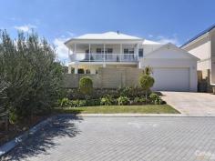  34 Mariners View Mindarie WA 6030 $1,149,000 LARGE FAMILY HOME Super Sized Large Family Home Packed with Features  * This beautiful double storey "designer" built home is packed and contains 4 good sized bedrooms (front upstairs master with ocean views), 3 bathrooms, study, 3 separate living areas (upstairs living/retreat leading to front balcony and downstairs lounge/family areas), combined meals/dining area, spacious and modernly appointed provincial kitchen, plenty of storage and much more.  * Inside features are numerous and include feature front entry/internal foyer leading to carpeted stairs to upstairs retreat, quality NSW Blackbutt wood floors to most of downstairs living and kitchen areas - and carpets to upstairs retreat and all bedroom areas. Additional features include high ceilings, 6 separate reverse cycle wall airconditioning systems, ceiling fans, internal security alarm and intercom to front gated entry, powered by 34 panel solar power system, quality fixtures, fittings and treatments throughout (including ornate cornicing and bulkheads, gas heaters and fireplaces, skirting boards, window capping and U/V blinds), kitchenette to upstairs retreat, walk in and built in robes to all bedrooms, a deluxe kitchen complete with quality Miele cooking appliances and Asko dishwashers, overhead cupboards, wine rack and buffets all finished off in Caesar stonework. All quality bathrooms throughout - with spa to ensuite - serviced by 2 x Rinnai instantaneous gas HWS (all up 4 controllers) and more.  * Outside features include rendered finish to all external walls, easy care, well established and fully reticulated front and rear lawns and gardens, and with ocean views from top front wrap around balcony. The balcony overlooks front secure and fenced below ground pool and garden courtyard setting. To the rear, you will find a paved private alfresco UMR with courtyard and lawn area. To the front is a double driveway leading to a good sized double lock up garage - with remote control door, high ceilings and shoppers entrance.  * Set on 608 sqm and nestled amongst some of Mindarie's finest homes, this property is only a short stroll to Mindarie Marina (and all its pubs, cafes and restaurants), beaches, schools, major shopping centre and all major public amenities. Must be viewed to be fully appreciated.  PROPERTY DETAILS $1,149,000 From ID: 381207 Land Area: 608 m² 