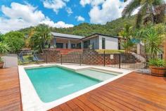  1 Maynard Cl Mount Sheridan QLD 4868  $499,000 Stand Out From The Crowd!! Capturing the essence of contemporary living this modern, executive style home will win over your heart. Situated in the hills of Mount Sheridan you will love the area as well as the outlook.  Featuring two spacious separate living areas, a well-appointed central kitchen, generously sized bedrooms, main with ensuite and walk-in robe, impressive outdoor entertaining area, double lock up garage and all of this whilst taking in the backdrop of the surrounding mountains.  Property Features: - 4 bedrooms all with built-in wardrobes and the master suite offering a luxurious ensuite and walk-in robe.  - Separate living areas including lounge, family and dining.  - Well-appointed kitchen with gas cook-top & stainless steel appliances.  - Impressive outdoor entertaining area which overlooks the in ground pool with the mountains as your backdrop.  - Air-conditioned throughout with split systems to all bedrooms and family room and a ducted system to the lounge room.  - Double remote lock up garage. - Side access with covered space for a boat. - Beautiful in-ground swimming pool with timber decking - Landscaped, fully fenced, 812sqm corner block.  - Built 2004. - Close to schools, shopping centers and all other amenities. This property offers the growing family something special to come home to & to top it all off you are buying into one of Cairns best locations! To arrange an inspection please contact Joanne.   Property Snapshot  Property Type: House Land Area: 812 m2 Features: Ensuite Air Conditioning Built-In-Robes Area Views Close to Schools Close to Shops Close to Transport Pool 