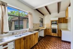  8 Wattle St Harlaxton QLD 4350 $349,000 Is this the biggest house on the market sub $350k in Toowoomba? Set on a glorious 761m2 with the rear yard primly positioned to catch a North East aspect this is an amazing amount of property for the price. Absolutely loaded this property offers - covered car accommodation for up to 8 vehicles, four bedrooms and study, multiple living rooms, large rear yard and even a view over the park. Competitively priced at $349,000 this is an amazing opportunity to secure a phenomenal amount of real estate for such an entry price. The property has recently undergone some updates including full internal repaint, new carpets and general refresh. Not everything is brand new but it is as neat as a pin and ready for a new owner today.  As you enter, you know this is a property you would be proud to call home; offering a great open feeling throughout. The sprawling floor plan offers a choice of layouts perfect for the family as it gives you the ability to be close to young children or create a separate zone for older teenagers. With a generous living at the front of the home encompassing vistas of the surrounding parkland as the main living, this expansive home also offers a second family room located at the rear; complete with a wood heater. The huge kitchen is very serviceable and is complete with approx 8 metres of bench space, a new oven, a new cook top, space for a dishwasher and massive amounts of storage. A separate dining is located directly from the kitchen; or you can chose to entertain your guest under the large North East facing rear patio.  There are four very large bedrooms all of which feature built-in storage. You have a choice of which room to use as the master, however the front room is away from the other bedrooms and a clever conversion would allow you to easily encompass the 2nd bathroom as an ensuite as they share a wall. This bathroom is complete with shower over bath and has ample room to add a second toilet. The second bathroom is perfectly located in the middle of the property to service the remaining three bedrooms. A large family sized laundry and study area complete the list of this exceptionally generous home.  The property features:  - Generous 761m2 allotment  - 8 Covered car spaces comprised of 4 bay shed, over height tandem drive through carport and second tandem carport  - 2 separate living areas, wood heater to rear living area  - Large North East facing covered alfresco area  - 4 generous bedrooms all with built in storage  - 2 bathrooms, one of which can easily be converted to ensuite  - Family sized laundry  - Open study which could be closed off to make a 5th bedroom if required  RealWay Property Partners Toowoomba is proud to present 8 Wattle Street, Harlaxton to the market. Join us at the next open home or arrange a private viewing by contact Cooper Watson on 0427 557 654. Property Features Water Rates : $265 Council Rates : $995 Land Size : 761 m2 