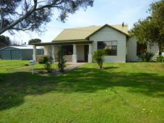  30 Bonney St Meningie SA 5264 $212,500 IDEAL FAMILY HOME ON LARGE ALLOTMENT Property ID: 10381945 This 3 bedroom home is positioned on a large ‘L’ shaped corner allotment of 1,411sqm approximately. Inside are large lounge with reverse cycle split system air-conditioner & slow combustion wood heater, 1990’s kitchen, sunroom, large bathroom & laundry. Outside is double garage, rainwater storage & low maintenance yard.  Close to all all township facilities. 