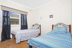  3 Wyreema St Largs North SA 5016 $390,000-$420,000 A Property of Opportunity - Over 21 metre frontage Property ID: 10706961 Covering a generous allotment of 600sqm approximately with a wide frontage, this property presents opportunity. Whether you are looking to invest in your future, purchase your first home or re-develop (subject to council consent), this home is for you. This property provides three bedrooms main is of substantial size with a large built-in wardrobe, spacious kitchen overlooking the lounge that create the central hub of the home and large rear yard with lawn areas for the children + pets to play. Key Features: - Three bedrooms, main bedroom with built-in wardrobe - Open lounge with large picture windows allowing natural light - Spacious original kitchen with stainless steel appliances + gas cooking - Original bathroom with separate w/c - Timber floors throughout - Rear pergola overlooks the large lawn area to create the perfect outdoor entertaining area - Front & rear established low maintenance gardens - Double width carport with automatic roller door + large shed to the rear Situated between the beach and the marina and surrounded by new and established homes. Only a short drive from Semaphore Road, the beach, local shopping, local reserves and public transport. This home is the perfect property of opportunity and offers many options for the successful purchaser.  *Currently tenanted Land Area 	 600.0 sqm 