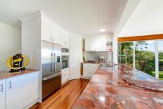  125 Atkinson Rd Bli Bli QLD 4560 $835,000.00 PREMIERE BLI BLI LIFESTYLE ACREAGE WAKE UP TO OCEAN VIEWS ! GRAND FAMILY HOME WITH MANY EXTRAS..POOL LARGE SHED EXOTIC GARDENS.. A truly magnificent property and arguably one of Bli Bli's finest. Lovingly presented very solid rendered mostly brick plus tile prestige home. Boasting 5 bedrooms and 2 spacious living spaces plus large utility/study or 3rd living area. Open plan kitchen/dining/living space with amazingly unique granite kitchen benchtops plus dishwasher, plumbing for fridge, stainless splash back and filtered water. 3 bathrooms including ensuite with spa and 4 toilets. Sky-lit walk in robe to master. Walk in wine cellar and abundant cupboard plus ceiling storage. Spacious tiled entry foyer. 4 air-conditioners. An ideal aspect with breathtaking ocean, Mount Coolum and rural views visible through expansive windows almost the entire length of the house. Beautifully polished hardwood floors. Quality LED lighting throughout. Large covered outdoor area complete with 2 fans, plus main bedroom sitting balcony deck. An established variety of native, fruit and exotic plants with a mixture of large rocks, pebbled areas, concrete kerbing, rock and brickwork garden edging. Peacefully and privately positioned with the enjoyment of plenty of birds and wildlife amongst surrounding natural bush. The most enticing pebble-concrete pool with expansive deck area. Fully fenced for your dog with lockable front privacy gates and sensor lights. Man sized approx 12x9m powered shed with wide concreted access, bench, mezzanine and ceiling fan, plus front double carport with firewood storage provision. Elevated at the end of a culdesac to enjoy cooling ocean breezes. 2 large water tanks plus town water. Storm drainage. Other features: Built-In Wardrobes,Close to Schools,Close to Shops,Close to Transport,Garden,2 Large Water Tanks Property Details Elders Property ID: 10333125 5 bedrooms 3 bathrooms 6 car parks Land Area 4865 square metres 4 car garage Double carport Swimming Pool Air Conditioning 