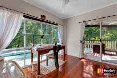  24 Hardwick St Stratford QLD 4870 $600,000's Enjoy The Serenity Of Stratford!!! Don't miss the Opportunity! Motivated Vendo Situated in the highly sought after suburb of Stratford is this beautiful four bedroom character home. Not only does it offer functional living it will win over your heart with its charm, superb finishes and seclusion.  Catering for the most discerning buyer this home offers impeccable finishes throughout. From the stone kitchen benchtops to the absolutely stunning timber floorboards there is something to capture your eye around every corner.  Set on a private 1050sqm of land with only one neighbour you are treated to a separate studio or teenagers escape and beautiful in ground swimming pool, both of which overlook the magnificent open space of the Jalarra Parklands.  At A Glance: - Four generously sized, air-conditioned bedrooms with the master suite offering a walk through robe, ensuite and private balcony. - A generous family bathroom with large plunge bath. - Separate powder room downstairs.  - A well-appointed kitchen which includes stone benchtops, stainless steel appliances and overlooks the outdoor entertainment area and parklands. - Open planned dining and lounge with separate studio overlooking Jalarra Park.  - Outdoor entertaining timber deck. - Beautiful in ground swimming pool surrounded by natural rainforest. - Double carport. - 1050sqm of land - Built 1996 I encourage you to inspect this beautiful home. Please call me to arrange a time that suits you.   Property Snapshot  Property Type: House Land Area: 1,050 m2 Features: Ensuite Air Conditioning Built-In-Robes Close to Schools Close to Shops Close to Transport Pool 