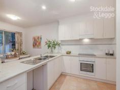  1/41 Hobbs Crescent Reservoir VIC 3073 Something Special Beautifully designed and built to the highest standards, here is an opportunity to move into your very own piece of paradise. Warm afternoon sun permeates through spacious open plan living areas as formal and casual zones blend seamlessly. The ambience is enhanced with tasteful decor, classic parquetry flooring and the practicality of modern kitchen facilities. A terrific covered entertaining area is ideal for summer gatherings and a large double garage is a real bonus too. Generous sleeping accommodation features three bedrooms, each with built in robes. Superbly located within walking distance to trains, schools and shops. Not just a home, this fine residence represents a choice of lifestyle that will impress the most discerning buyer. 
