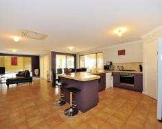  8 Harrington Waters Dr Waikiki WA 6169 $435,000 EASY CARE HARRINGTON WATERS HOME This 4x2 home in Harrington Waters is one to be viewed. Featuring an open plan kitchen, living and dining area and a large theatre room for all the family to enjoy. Entertain outside under your large gabled alfresco area and enclosed grassed backyard with garden shed.  After hours viewings available on request.Call Paul Ellis on 0457 700 500 All bedrooms have split system air-conditioners to keep all the family cool in summer and warm in winter. Master bedroom with walk in robe and ensuite to the front to the home. The minor bedrooms all with built in double wardrobes. Enjoy the Harrington Waters Lifestyle being located walking distance to shops, schools, fantastic parks and public transport. Possible side access for caravan or boat. Other features: Built-In Wardrobes,Close to Schools,Close to Shops,Close to Transport,Garden,Theatre, Garden Shed Property Details Elders Property ID: 10625311 4 bedrooms 2 bathrooms 2 car parks Land Area 459 square metres Double garage Air Conditioning 