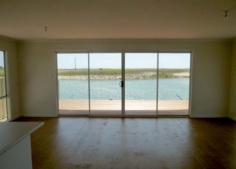  76 Warrengie Dr Meningie SA 5264 $239,950 McCUBBIN 3' by Sarah Homes in 'Meningie Waters' Property ID: 9035776 Brand new 3 bedroom home by award winning Sarah Homes is near completion in Stage 1 of ‘Meningie Waters’ adjacent to the beautiful Lake Albert. Enjoy this 525 sqm easy-care allotment with waterway frontage includes separate living area, open plan living meals & kitchen area, upgraded insulation, large kitchen including island bench, overhead cupboards, stainless steel appliances, generous amount of electrical inclusions, instantaneous 27 litres / minute gas hot water service & carport, verandah with hardwood decking & carport.  Also included in the offer is 1 year membership to the Lake Albert Golf Club, one of the best country courses in SA. Included in the offer 1 year membership to the Lake Albert Golf Club, one of the best country courses in SA. Make sure you take advantage of the Seniors Housing Grant of $8,500 if your 60 or over (conditions apply). ‘Meningie Waters’ is only 90 minutes drive from Adelaide, just 1.2 km from Meningie CBD & 5 minutes drive to the Coorong National Park. 700sqm allotments are also available in Stage 1. We can organise construction for you or work with your favourite builder, and we have a range of House & Land packages for you to choose from. Land Area 	 525.0 sqm 