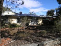  14 Axehead Rd Roxby Downs SA 5725 $180 per week Neat 3 Bedroom Home Property ID: 7168732 This neat property offers 3 good size bedrooms all with built in robes. The spacious lounge comes with gas heating, and the kitchen contains ample cupboard space. A full length rear verandah, two pergola areas, colour-bond tool shed and garden areas to the front and rear of the property make this a relaxing property good for entertaining. Evaporative cooling and gas heating keep the house enjoyable all year round. Call now to arrange an inspection. 