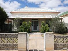  55 Goode Rd Port Pirie West SA 5540 $175,000  CHARMING COTTAGE HOME!! This solidly constructed cottage style home is located on a large allotment with 2 separate titles. This freshly painted cottage oozes character & charm with ornate fireplace surrounds, timber doors, high ceilings & skirtings. The lovely slate floored kitchen has been upgraded & provides a gas cooker, rangehood & ample cupboard & bench space. The 3 bedrooms are all a good size & all have ceilings fans, with 2 of the bedrooms having quality built-in robes. The spacious lounge provides a reverse cycle air-conditioner plus there are brand new carpets throughout the home. The neatly tiled bathroom offers a shower over the bath & vanity. Other features include a slate floored lobby to the rear, separate toilet & a large outside laundry. Externally, the home is complemented with front & rear verandahs, aluminium windows throughout, fruit trees & a rear access to the double garage complete with concrete floor. All this & more located on a 778 sqm allotment. Enquire Now!! PROPERTY DETAILS $175,000  ID: 387225 Council Rates: $1,160.20 Land Area: 778 m² Zoning: Residential 