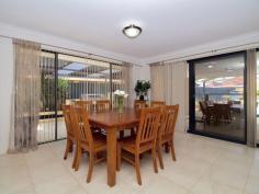  22 Durance Dr Port Kennedy WA 6172 $500,000's ST CLAIR BEAUTY Well maintained spacious family residence in St Clair Estate, surrounded by parks, close to beach, shopping, schools and Aqua Jetty recreational centre. The king size main bedroom is located to the right of the entry and has His and Hers walk in robes, open ensuite with step up corner bath, separate shower and closed toilet. To the left of the entry is a large formal lounge with french doors for movie night or just some quiet time. The tiled hallway leads to the open family and meals area and are overlooked by the kitchen with stainless steel range hood and dishwasher, walk in pantry and the added convenience of a shopper's entrance from the garage. Step through the french door that separates the 3 double sized bedrooms, all with built in robes and are serviced by the main bathroom that includes separate shower and bath. The entertainment Alfresco has been extended by a large colour bond patio that overlooks the fully paved back yard and provides part shade to the below ground salt water pool. All set upon a 659sqm low maintenance block with poured limestone and brick paving to front and rear yards, there is 2m access side access gate ideal for a trailer and personal access door through back of the double garage. Extra Features Include: - 	 Ducted evaporative air conditioning - 	 Tiled living areas - 	 3 x 4m garden shed - 	 Insulated roof With almost nothing to do but move in and starting living, add this to your list of must sees by calling Brett Lee 0427 220 660 today to arrange your viewing. *The description provided is for general information purposes only. ACTON Rockingham/Baldivis believes that this information is correct but it does not warrant or guarantee the accuracy of the information. Buyers are asked to undertake independent due diligence investigations and enquiries regarding the property, as no responsibility can be accepted by ACTON Rockingham/Baldivis for any information that may be deemed incorrect. 