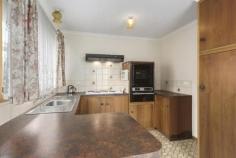  2/1A Crudwell Court Upper Burnie TAS 7320 $195,000 STAND ALONE VILLA Easy to mistake for a brick house the word unit does not enter your thoughts whilst driving past. The convenience of the Upper Burnie shopping precinct close at hand and set off the busy thoroughfare of adjoining streets, this is a peaceful property to be enjoyed. Tidy bitumen driveway and gardens provide those extras adding to the street appeal. Internally enjoy the open plan living space with reverse cycle air conditioning, 2 bedrooms with quality original built in robes and the separate bath and shower provide a very presentable bathroom. Small undercover area in the back porch would create a planter box haven and the rear yard has a handy garden shed. Level set and brick and the desirable and convenient location make this property a first choice for any couple after cosy surroundings! Call Andrew. Other features: Built-In Wardrobes,Close to Schools,Close to Shops,Close to Transport,Garden Property Details Elders Property ID: 10680356 2 bedrooms 1 bathrooms 1 car parks Land Area 291 square metres Single carport Air Conditioning 