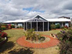  16 Bluewater Cres Shearwater TAS 7307 $400,000 FOR THE FAMILY WHO LOVE THE BEACH! If you've been searching for that perfect blend of large family home and relaxed seaside lifestyle then this substantial property is the one.  Enviably positioned at the end of a quiet and peaceful cul de sac, it is just metres from Shearwater Park and stunning Freers Beach through direct walkway access from the back garden gate with the private backdrop of Rubicon reserve.  The home itself has a welcoming tiled foyer opening on to the first reception room. Solid timber feature double doors lead through to the expansive kitchen/dining/living room with its striking cathedral ceiling and high port hole windows.  This generous space opens through sliding patio doors out to the sun filled conservatory providing a wonderful space to relax or entertain all year round.  There are 4 spacious double bedrooms all with built in robes and 2 bathrooms, ample room for the large family, separate laundry, double garage and generous storage throughout.  The solid brick rendered construction creates a beautifully cool interior in the summer and is surrounded by almost 1,000m2 of secure, low maintenance landscaped gardens.  Located in a safe and peaceful corner of beautiful Shearwater with its Resort, golf course, shopping centre and safe sandy beaches, this delightful home must be viewed to be appreciated.  4 bedrooms, 2 bathrooms, 2 reception rooms  Large 986 m2 of private gardens  Dual air conditioning  Monitored security system  Walkway access to park and beach  6m x 5m Conservatory General Features Property Type: House Bedrooms: 4 Bathrooms: 2 Land Size: 986 m2 