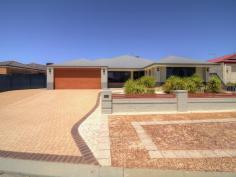  22 Durance Dr Port Kennedy WA 6172 $500,000's ST CLAIR BEAUTY Well maintained spacious family residence in St Clair Estate, surrounded by parks, close to beach, shopping, schools and Aqua Jetty recreational centre. The king size main bedroom is located to the right of the entry and has His and Hers walk in robes, open ensuite with step up corner bath, separate shower and closed toilet. To the left of the entry is a large formal lounge with french doors for movie night or just some quiet time. The tiled hallway leads to the open family and meals area and are overlooked by the kitchen with stainless steel range hood and dishwasher, walk in pantry and the added convenience of a shopper's entrance from the garage. Step through the french door that separates the 3 double sized bedrooms, all with built in robes and are serviced by the main bathroom that includes separate shower and bath. The entertainment Alfresco has been extended by a large colour bond patio that overlooks the fully paved back yard and provides part shade to the below ground salt water pool. All set upon a 659sqm low maintenance block with poured limestone and brick paving to front and rear yards, there is 2m access side access gate ideal for a trailer and personal access door through back of the double garage. Extra Features Include: - 	 Ducted evaporative air conditioning - 	 Tiled living areas - 	 3 x 4m garden shed - 	 Insulated roof With almost nothing to do but move in and starting living, add this to your list of must sees by calling Brett Lee 0427 220 660 today to arrange your viewing. *The description provided is for general information purposes only. ACTON Rockingham/Baldivis believes that this information is correct but it does not warrant or guarantee the accuracy of the information. Buyers are asked to undertake independent due diligence investigations and enquiries regarding the property, as no responsibility can be accepted by ACTON Rockingham/Baldivis for any information that may be deemed incorrect. 
