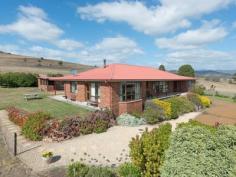  1001 Lyell Hwy Sorell Creek TAS 7140 $750,000 "Sunnyside" With spectacular views over the River Derwent, Sunnyside is located at the gateway to the magnificent Derwent Valley. The land slopes gently from the road frontage and has a perfect northerly aspect. This area is recognised for its 'terra rossa' soils - (a type of red clay soil produced by the weathering of limestone), this soil structure is quite rare and is identified as being the perfect medium for producing premium wines and cherries. The future for "Sunnyside" could well be in a very exciting horticultural enterprise. Alternatively you might continue with a small scale grazing operation or house the families' horses. The spacious, entertainers home is perfect in every detail. Set in easy care gardens with an outdoor BBQ room and a gazebo that adjoin the 1st class tennis court. It is a great home for happy families looking for a convenient and healthy lifestyle. Attention to detail, excellent craftsmanship and sunny river views are testament to the design and thought process that has resulted in a meticulously presented, quality home, in a superb position. - Very realistic auction expectations - Irrigation water from permanent, reliable TasWater system  - Gently sloping, north facing, productive soil types - "Mediterranean climate" - minimal risk of late frosts (vineyards, cherries) - 20 minute commute to Hobart CBD - Large shearing shed/workshop 3 2 3 General Features Property Type: Rural Bedrooms: 3 Bathrooms: 2 Land Size: 30.81 Hectares Peter Wade Real Estate Agent 