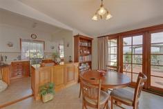  56 Risby St Ulverstone TAS 7315 $290,000 Location and Character Originally built in 1939 and situated on a large block (1047m2) this lovely family home has been tastefully renovated. The verandah at the front and the leadlight windows give it that character of yesteryear.  The welcoming hallway is wide and takes you to four generous size bedrooms, (one is currently used as a sitting room). Access the open plan living area through double glass doors. The galley style timber kitchen at one end has a breakfast bar. The dining and lounge areas follow. French doors open out to the spacious deck overlooking the neat garden. The laundry and the bathroom are at the rear of the home. Outside is a large garage/workshop with an adjoining carport. The backyard is level and has a veggie patch, fruit trees and room for kids to play.  This immaculate home is situated within walking distance from the CBD and schools. You'll love it! General Features Property Type: House Bedrooms: 4 Bathrooms: 1 Land Size: 1047 m2 