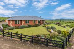  508 Nugent Rd Wattle Hill TAS 7172 $700,000 Executive country retreat in stunning location Beautifully located high on the hill to take advantage of the simply stunning valley views, boasting an everchanging panorama that will never fail to impress, this impeccably presented executive retreat will be sure to have great appeal to purchasers searching for a generously proportioned family residence of absolute quality.  Surrounded by beautifully tended gardens and rolling lawns, and comprehensively completed with absolutely nothing left to do indoors or out, this absolutely beautiful home offers spacious accommodation over one level, with plenty of double glazed windows encouraging an abundance of natural light and of course, framing the stunning country views. The main living zone is open plan, with the spacious and well appointed all white kitchen forming a focal hub for family interaction, plus tiled dining area adjacent. Thoughtfully designed with functional family living in mind, the parents retreat is a fantastic feature, with large separate living area, bedroom with full wall of wardrobes, and sleek ensuite boasting double walk in shower, spa & double vanity. The bedroom wing at the other end of house houses a further three double bedrooms, all with inbuilt wardrobes, plus crisp family bathroom with separate bath and shower. Also, separate storeroom, large laundry with direct access outdoors. The entire interior has been decorated in a neutral colour palette allowing for a range of decorating styles, and has been impeccably maintained by the present owners. Vehicle accommodation is extensive, with double carport allowing totally undercover access to the main living room, plus there is a gravel turning circle providing additional parking. The garage and workshop (108m2) is certainly a most appealing feature, comprising vehicle storage, huge workshop space and a brilliant country style entertaining area complete with woodheater, toilet and bar, a great place to entertain friends and family outside of the house. Alternatively, this garage could easily be converted to stables, tack room or hay storage should you wish. The 40m2 kennels are ideal for people with working dogs, and are just behind the garage. The acreage (12.8 acres) is quality fertile land, presently separated in to several paddocks with a mix of smart timber fencing around the house and electric to the paddocks. Equestrians will appreciate the abundant grass which allows potential for growing your own hay, and there is plenty of space on the lower side of the property to construct an arena should you wish. In fact, the land would suit a hobby farmer for a range of rural activities, or simply just to enjoy the space and seclusion this serene property offers. A simply stunning country retreat completed to a high standard, the lifestyle here is unrivalled. Offering the peace and quiet of the Country, yet you are only 5 minutes to bustling Sorell, and 10 minutes to the Airport and a range of local Beaches. An exemplary property in every respect. General Features Property Type: House Bedrooms: 4 Bathrooms: 2 Land Size: 12.8 Acres 