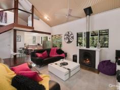  9 Native Bird Pl Buderim QLD 4556 $889,000  Bali At Home, Tranquil Resort Style Living Revitalise your inner spirit and peace in this resort style home located on the acreage foothills of Buderim. Sprawling over natural rainforest behind remote gates, this stunning pavilion style residence is interlocked by a defined entrance, encapsulated by running water features that leads into the outdoor living room deck. From here, you can relax and enjoy the sounds of nature, overlooking your own private pool and rainforest. A charming Pot Belly Stove ensures warm comfort for those cooler months.  This home has dual accommodation to cater for a growing family. Features include: a raised spa with running water features through to a lagoon pool. This hidden sanctuary offers more than you could imagine and is sure to impress those who wish to holiday at home.  To the main residence there is an air-conditioned spacious open plan kitchen living/dining area, with feature high ceilings. There are ample windows and timber stacker doors that allow plenty of natural light into the home. This area is fully tiled and has a modern kitchen, with excellent appliances and island bench. Adjacent is a hallway which leads to the king size master bedroom. It has a large walk-in wardrobe and adjacent bathroom, with a bath, shower, powder room area and separate toilet. There is also a second queen size bedroom that has built-in wardrobes and ceiling fan.  Your separate guest accommodation incorporates a spacious open plan living area, with beautiful timber flooring and tiling, soaring high ceilings and a timber staircase that leads up to a bedroom loft. The centre piece of the room is an ornate open feature fire place, where you can spend winter nights relaxing. Adjacent is a well equipped kitchen area with sink, ample cupboard and bench top space, plus dishwasher. There is a separate shower room with toilet, single vanity and shower. To the outdoors off the living area you have your own private balcony that has timber flooring. Here you can sit and enjoy the tranquil rainforest views.  Leading off from the main living area is a stunning master bedroom which has a huge separate walk-in wardrobe. It has its own private en-suite with a double shower, plus single vanity and toilet. The master bedroom has its own private timber deck, which leads out to the swimming pool.  To the outdoors in the main entrance area, is the enormous Balinese style undercover outdoor living deck, which is large enough to host the largest of occasions and family gatherings, in your own private surroundings. This truly unique home has far too many features to list. Only an inspection will do it justice.  - Four Bedrooms, Plus Study, Plus Loft, Plus Craft Room  - Gated Approx 2,002m² Acreage Allotment, In Cul-de-sac Location  - Approx 421m² Home  Main Residence Features:  - King Size Master Bedroom With Spacious Walk-In Robe & Ceiling Fan  - Queen-Size Bedroom With Built-In Wardrobe & Ceiling Fan  - Bathroom, Single Vanity, Bath, Shower & Separate Toilet  - Air-Conditioned Spacious Tiled Kitchen Dining/Living  - Soaring High Ceilings  - Kitchen With 900m Free Standing Oven & Range Hood  - Ample Cupboard & Bench Top Space, Plus Bosch Dishwasher  - Large Separate Multi-purpose Room Underneath Main Residence  Guest House Features:  - Master Bedroom With Private Balcony & Timber Decks  - Large En-Suite With Shower, Single Vanity & Toilet  - Spacious Separate Walk-In Wardrobe  - Spacious Open Plan Living Area & Feature Fire Place  - Kitchen, Ample Cupboard & Bench Top Space, Sink & Dishwasher  - Polished Timber Floors & Tiling, Timber Staircase To Bedroom Loft  - Separate Shower Room, Single Vanity, Shower & Toilet  - Large Separate Walk-in Storage Room With Shelving  Outdoor Features:  - Stunning Water Feature To Main Entrance  - Undercover Balinese Outdoor Living Area Overlooking Pool Area  - Surrounded By Stunning Private Rainforest Back Drop  - Extensive Outdoor Timber Decking & Timber Doors  - Lagoon Style Pool With Spa & Cascading Waterfall Feature  - Large Undercover Area For Caravan/Boat Or Work/Shop  - Spectacular Rainforest Views From All Rooms  - Private Lush Gardens With Lots Of Birdlife & Fauna  - Larger Than Average Separate Double Remote Garage  This is a rare opportunity to purchase an executive dual accommodation residence. Only an inspection can do this property justice.  PROPERTY DETAILS $889,000  ID: 385224 Land Area: 2002 m² Building Area: 421 