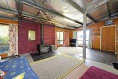  23 Handsome Caves Rd Magra TAS 7140 $175,000 Life in the Country (but pretty handy to town) The options are plenty at this exciting property that is located just a few minutes out of New Norfolk. Located in a very private setting and offering a good mix of pasture and bush and a very pretty dam, there is a lot to like here. Lots of sheds, a bush sleep-out and a very comfortable temporary dwelling (really a small house) it's just perfect as a weekender or as a base to stay while you create and enjoy your bushland oasis. Attractively landscaped gardens and with good access tracks and a lifetimes supply of firewood at hand, this really is a very appealing option. A short bushwalk from this block delivers you to very attractive sandstone outcroppings and the interesting, sandstone Handsome Caves. Sit back on the deck, relax in the outdoor spa with a glass of wine and simply enjoy the serenity. Life in the bush - it doesn't get much better than this. General Features Property Type: House Bedrooms: 1 Bathrooms: 1 Land Size: 16.22 Hectares 