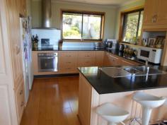  13 Alma Rd Orford TAS 7190 $365,000 Reside or holiday Enjoy a beautiful vista over white sand and the bay to Maria Island from this neat, brick veneer home. Set over two levels it has living areas, bedrooms and bathrooms on the upper level and a large rumpus/fourth bedroom and garage/workshop on the lower level. The modern, spacious kitchen has attractive granite bench tops and opens to dining and lounge area. The main bedroom has a large walk in robe and ensuite awake to stunning sun rises over Maria Island. Bathroom has a separate bath and shower. At rear is a sheltered, undercover patio and large grassed area wonderful for children and pets. Just a short walk to the river and beaches this property offers comfort and ease as either a residence or holiday home. General Features Property Type: House Bedrooms: 3 Bathrooms: 2 Land Size: 1000 m2 