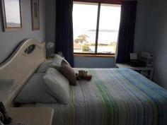  13 Alma Rd Orford TAS 7190 $365,000 Reside or holiday Enjoy a beautiful vista over white sand and the bay to Maria Island from this neat, brick veneer home. Set over two levels it has living areas, bedrooms and bathrooms on the upper level and a large rumpus/fourth bedroom and garage/workshop on the lower level. The modern, spacious kitchen has attractive granite bench tops and opens to dining and lounge area. The main bedroom has a large walk in robe and ensuite awake to stunning sun rises over Maria Island. Bathroom has a separate bath and shower. At rear is a sheltered, undercover patio and large grassed area wonderful for children and pets. Just a short walk to the river and beaches this property offers comfort and ease as either a residence or holiday home. General Features Property Type: House Bedrooms: 3 Bathrooms: 2 Land Size: 1000 m2 