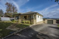  56 Risby St Ulverstone TAS 7315 $290,000 Location and Character Originally built in 1939 and situated on a large block (1047m2) this lovely family home has been tastefully renovated. The verandah at the front and the leadlight windows give it that character of yesteryear.  The welcoming hallway is wide and takes you to four generous size bedrooms, (one is currently used as a sitting room). Access the open plan living area through double glass doors. The galley style timber kitchen at one end has a breakfast bar. The dining and lounge areas follow. French doors open out to the spacious deck overlooking the neat garden. The laundry and the bathroom are at the rear of the home. Outside is a large garage/workshop with an adjoining carport. The backyard is level and has a veggie patch, fruit trees and room for kids to play.  This immaculate home is situated within walking distance from the CBD and schools. You'll love it! General Features Property Type: House Bedrooms: 4 Bathrooms: 1 Land Size: 1047 m2 