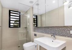  14/ 42 Kororoit Creek Road,  Williamstown VIC 3016 Ticking all the boxes this near new striking first floor contemporary apartment delivers a super sophisticated architecturally designed environment with entertaining terrace. Beautifully styled the open-plan living/dining area is accompanied by a gourmet galley kitchen with stone benchtop, mirror splashback and stainless steel appliances. Floor to ceiling tiles adorn the bathroom with a walk in shower, rainfall showerhead and masses of mirrored storage. Quality natural timber flooring and wool textured loop carpet a featured throughout. Reverse cycle heating and cooling, secure undercover car parking with storage cage, communal bike facilities, lift access and twenty four hour security code access are all part of the impressive package. Perfect for an executive single or couple in the highly sought after Williamstown North area. Stroll to shops and the Williamstown North train station and only a short walk to Williamstown Beach, this apartment will truly impress!   Inspection Times Inspect 7 days by appointment  