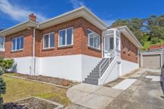  22 Moody St Burnie TAS 7320 $265,000 A MODERN 1943, CUSP OF CBD (Please click on virtual tour for floor plan) Character and charm meets slick and modern creating a low maintenance home with the street appeal from years gone by but with the comfort of today. Position - 700m to Cattley Street the heart of the town Centre or 400m to the fringe, in Real Estate the key factor is position and for those after convenience then this street will win every time! You may ask yourself; "How can you make a solid 1943 home any better?" Well the current owner has taken this property to the next level with extensive re-plastering, rewiring, re-plumbing, new kitchen and appliances, updated bathroom, double glazed windows, reverse cycle air conditioning plus wood heating, extensive and skillfully arranged floor tiling, brand new carpet and extra assurance knowing the lid is water tight with replaced valleys on the terracotta tiled roof! As per the floor plan, 3 bedrooms or 2 generous sized bedrooms and a 2nd sun room facing east (still single bedroom size), open plan living space, sun room facing west, 2nd toilet, lock up garage and storage space under home. Call Andrew to inspect this beautifully presented property! Other features: Built-In Wardrobes,Close to Shops,Close to Transport,Fireplace(s),Garden,Secure Parking Property Details Elders Property ID: 10703865 3 bedrooms 1 bathrooms 1 car parks Land Area 619 square metres Single garage Air Conditioning 