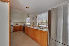  56 Risby St Ulverstone TAS 7315 $290,000 Location and Character Originally built in 1939 and situated on a large block (1047m2) this lovely family home has been tastefully renovated. The verandah at the front and the leadlight windows give it that character of yesteryear.  The welcoming hallway is wide and takes you to four generous size bedrooms, (one is currently used as a sitting room). Access the open plan living area through double glass doors. The galley style timber kitchen at one end has a breakfast bar. The dining and lounge areas follow. French doors open out to the spacious deck overlooking the neat garden. The laundry and the bathroom are at the rear of the home. Outside is a large garage/workshop with an adjoining carport. The backyard is level and has a veggie patch, fruit trees and room for kids to play.  This immaculate home is situated within walking distance from the CBD and schools. You'll love it! General Features Property Type: House Bedrooms: 4 Bathrooms: 1 Land Size: 1047 m2 
