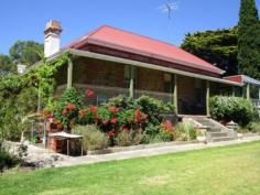  115 Muellers Rd Birdwood SA 5234 $525,000 CLASSIC STONE HOME ON 4 ACRES Property ID: 7451238 Originally built in 1886 this three bedroom stone home oozes plenty of old world charm and character. The main cellar is off the family room with plenty of storage and the other cellar has two rooms which is under the residence, walk in pantry, central Kitchen and a large formal lounge and dining. Open fire with original surrounds in one of the front bedrooms plus in the center of the home there is a combustion heater to cater for the chili winters. A bright and sunny games room that is the length of the residence there is also a studio/office with outside entrance. Old stone out buildings, fruit frees, veggie garden, plenty of rain water. Located in one of the most prominent locations in the Adelaide Hills. The long driveway that leads to the residence is charming with a natural spring and creek. 4 ac of grazing, a property like this is very hard to find and definitely worth a look. Building / Floor Area 	 202 sqm Land Area 	 1.79 hectares 