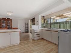  19 Kurrajong Rd Safety Bay WA 6169 $300,000's CHARMING HOME AND A HUGE BACKYARD! Positioned on a large 704sqm block in Safety Bay, this property would be perfect for anyone wanting a huge back yard that is ready for a pool or workshop, or for someone who is just looking for a wide open space to enjoy with the family.  The property offers a good size lounge which enjoys a front yard outlook and flows through to the separate dining area which has been cleverly redesigned into a study nook with built in desk and shelving. The spacious living area occupying the centre of the home is overlooked by the open plan kitchen that offers additional access through to the front of the home. Complete with good bench space, gas stove and rangehood, the kitchen enjoys views out to the patio and is ideally located for entertaining visiting guests. Each of the bedrooms are located to the rear of the property and are serviced by the updated bathroom that has been modernised with glass screen shower and chic vanity. Outside, the patio provides a great entertaining space that overlooks the rear yard which is complete with raised garden beds, two sheds and a huge lawn which is ideal for adding a swimming pool or workshop. Located at the rear of the single garage is a good size brick workshop or storeroom, perfect for a man cave or just storing additional belongings from your new home.  Other features include: - 	 Ducted reverse cycle A/C - 	 Potential drive through side access  - 	 Automatic bore reticulation  With everything that the Safety Bay area offers, you'll have the benefit of schools, parks, beaches and shopping all just a few minutes away - you could not ask for a better location or property! Contact David Parlor on 0412 734 727 for a private viewing. 