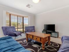  19 Kurrajong Rd Safety Bay WA 6169 $300,000's CHARMING HOME AND A HUGE BACKYARD! Positioned on a large 704sqm block in Safety Bay, this property would be perfect for anyone wanting a huge back yard that is ready for a pool or workshop, or for someone who is just looking for a wide open space to enjoy with the family.  The property offers a good size lounge which enjoys a front yard outlook and flows through to the separate dining area which has been cleverly redesigned into a study nook with built in desk and shelving. The spacious living area occupying the centre of the home is overlooked by the open plan kitchen that offers additional access through to the front of the home. Complete with good bench space, gas stove and rangehood, the kitchen enjoys views out to the patio and is ideally located for entertaining visiting guests. Each of the bedrooms are located to the rear of the property and are serviced by the updated bathroom that has been modernised with glass screen shower and chic vanity. Outside, the patio provides a great entertaining space that overlooks the rear yard which is complete with raised garden beds, two sheds and a huge lawn which is ideal for adding a swimming pool or workshop. Located at the rear of the single garage is a good size brick workshop or storeroom, perfect for a man cave or just storing additional belongings from your new home.  Other features include: - 	 Ducted reverse cycle A/C - 	 Potential drive through side access  - 	 Automatic bore reticulation  With everything that the Safety Bay area offers, you'll have the benefit of schools, parks, beaches and shopping all just a few minutes away - you could not ask for a better location or property! Contact David Parlor on 0412 734 727 for a private viewing. 