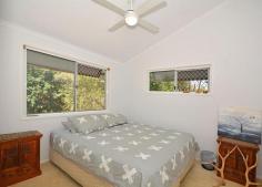  32 Swan Dr Booral QLD 4655 $335,000 A HOME AMONGST THE GUM TREES Sitting well back from the road on 4970m2 of fenced land you will find this unique two bedroom residence that will appeal to the buyer who likes their privacy, and space for their four legged friends. The shady full length front veranda is a great place for evening BBQ'S or just a quiet space to sit with a good book and enjoy the peace and tranquility of your surrounds. Inside, the living area & bedrooms features raked ceilings with both bedrooms having built in robes. The kitchen is modern and features a glass cook top and pantry. Separated from the main dwelling by a covered breeze way sits a double lock up Garage, presently utilized as a bar and snooker room. A new 9x6m Colorbond Shed sits at the side of the block and would be ideal to house the boat and van. This gently sloping block is dotted with shade trees and shrubs yet it still has lots of open space for the new Owner to stamp their own character on the property. You are only a short 10 minute drive from all the attractions of Hervey Bay yet far enough away to enjoy a healthy country life style. So put on the Akubra and riding boots and let's go & have a look at your new Mini Ranch. Property Features Land Size : 4970 m2 