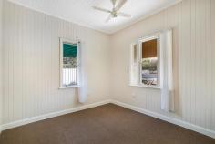  68 Mort St North Toowoomba QLD 4350 $269,000 NORTH SIDE CHARACTER WITH FUTURE OPTIONS Located in the highly popular Mort Estate precinct, this property is just seconds to the CBD as well as many of Toowoomba's boutique eateries & cafes which provides an ideal opportunity for the owner occupier or investor. Zoned light industry which may allow future development in a commercial sense (subject to council approvals), you could acquire this inner city dwelling and make the most of the gorgeous character charm today and plan your future development opportunities.  Having recently undergone a face lift - including new floor coverings, a full internal repaint, a new roof and partially re-stumped - this property will make for an attractive rental property; and has enjoyed solid returns over the past 4 years.  The property features:  - Character charm throughout including VJ walls, high VJ ceilings, fret work, timber floorboards (covered), front porch.  - 3 huge bedrooms, one with a walk in wardrobe or private study.  - Large lounge room with a fireplace/heater.  - Dining located directly off the kitchen.  - Generous kitchen with upgraded 900mm cooker.  - Bathroom with separate toilet.  - Single car carport.  - Fully fenced yard.  RealWay Property Partners is proud to present 68 Mort Street, North Toowoomba to the market. To arrange a private viewing, please call Cooper on 0427 557 654 or join us at the next open home. Property Dates and Times Inspection Times  18 February 12:00 PM - 12:30 PM  19 February 12:00 PM - 12:30 PM Property Features Water Rates : $265 Council Rates : $916 Land Size : 607 m2 