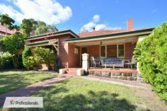  130 Hubert St East Victoria Park WA 6101 Character Plus Location... It's a Perfect Match! House - Property ID: 915131 ****HOME OPEN SATURDAY THE 18TH OF FEBRUARY AT 11.30AM TO 12PM**** A match made in real estate heaven, this perfectly situated character home is just a 3 minute stroll to cafs and restaurants and convenient access to public transport. In addition to this, its great location means this appealing 1940s brick and tile home is in close proximity to Perth's entertainment district including the Crown Casino, Swan River foreshore development, the soon to be completed Perth Stadium and Perth Airport as well as providing easy access to the Perth CBD. Oozing charm and character, this well maintained, solidly built street front home, in a private group of two residences, has much to offer astute buyers. From the shaded front veranda the front door leads into the main entrance hallway to reveal the home's original polished jarrah floorboards and high ceilings. From here you can step through to the tastefully renovated living area and kitchen, with the spacious bathroom and bedrooms beyond. There is also a separate dining room located off the kitchen plus a rear family room with additional separate toilet and modern laundry, providing plenty of living or working space for all the family. The property is leased until the early March at $420 per week. Features of this character home include: • 	 Jarrah floor boards and timber Venetian blinds.  • 	 Central modern kitchen.  • New gas oven with range hood. • Instantaneous gas hot water. • Ducted evaporative air-conditioning. • 	 Formal lounge with high ornate ceiling and feature gas fire place. • 	 Elegant dining room. • 	 Large light filled third room which could be used as a play area, office, rumpus or family room. • 	 Federation styled bathroom with a second toilet.  • Spacious modern laundry. • 	 Private low maintenance garden with automatic reticulation.  • 	 Rear carport and car bay with storage shed. • 	 NBN service available and connected. • A very low maintenance, easy to live in home. Just move in and unpack. A beautiful character home such as this does not come onto the market very often, so interest and demand will be high as it is perfect for the first home buyer or discerning investor.  Features  Close to Schools  Close to Shops  Close to Transport  Fireplace(s)  Garden  Polished Timber Floor 