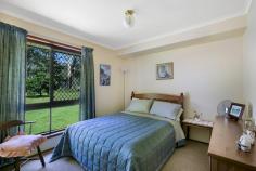  9933 New England Hwy Cabarlah QLD 4352 $485,000 LIFESTYLE PROPERTY - 2 ACRES OF PURE BLISS Are you looking for a picture perfect 2 acres of privacy within a stones throw of Toowoomba and Highfields? Look no further as your dream property is presented. The single owner Gordon Bourke home has been fastidiously maintained and feels like it was only built yesterday. Whilst not brand new, those who appreciate a true quality build will inspect this home and know it was built by builders when quality of work was paramount. Well positioned on the block well away from the road it offers privacy from the street and the rear neighbour, clever planting and positioning again allows you to enjoy the home without a neighbour in sight. With an amazing floorplan that soaks in natural lights and vistas of the treed allotment and covered car accommodation for up to eight vehicles, this is lifestyle buying at its very best.  Picture yourself in summer enjoying a meal in the North East facing generous outdoor alfresco whilst watching your family play under the shady tree lined rear yard or on cozy weekend in Toowoomba's winters soaking in the warmth of the wood heater. Ticking all the boxes for what lifestyle should be; it is an absolute must inspect. A credit to the single owners of this property, there really isn't a dollar to spend - the fencing is all in good condition, the oversized shed is near new, there are two water tanks, there is even firewood on the block ready to stoke the heater. Just pack up your current home and move straight in. There is room of course to add some value down the track by modernising the home and any savvy buyer will surely see what is on offer here is amazing buying. Built by owner occupiers FOR owner occupiers, the generous bedrooms, wide hallways and just a solid layout will make this an enjoyable home to own.  Property Features:  Open plan living and dining with North East aspect  Central kitchen with generous storage  Second family living room complete with wood heater  40m2 covered North East facing alfresco area  Generous master with ensuite and full of storage  3 further bedrooms - 2 generous, the 3rd still a great size and all with built-in storage  Full sized laundry with direct yard access  Double car garage  Double car carport attached to the home  Detached 6m x 7m shed with over height 3.2m doors  2nd timber double car carport  Security screens throughout  Solid construction with cypress and hardwood frames  8098m2 fully fenced allotment  RealWay Property Partners is proud to present to the market 9933 New England Highway. Call Cooper Watson today to arrange your exclusive viewing or join us at the next open home. Property Dates and Times Inspection Times  18 February 11:00 AM - 11:30 AM  19 February 11:00 AM - 11:30 AM Property Features Water Rates : $265 Council Rates : $868 Land Size : 8094 m2 