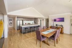  13 Wentworth Loop Dunsborough WA 6281 $639,000 THE NAUTILUS' BY DALE ALCOCK This big family home is perfectly positioned with a feature park a stones' throw away and the 16th tee of the Dunsborough Lakes golf course just a 200m stroll away. On an elevated 667sqm block, the home consists of four big bedrooms, two bathrooms, study/fifth bedroom, large separate theatre room and huge open plan living. The large open plan living has high ceilings throughout is perfect to take in the winter sun and maximise all the natural lighting the home offers. The kitchen has everything the aspiring chefs requires with quality stainless steel appliances, 5 burner gas cooktop, electric oven, rangehood and dishwasher, stone bench tops, breakfast bar, double sink, soft close drawers and cupboards finish off and compliment the area perfectly. All bedrooms are big with the master having a huge walk in robe, ensuite with his/her vanities and shower heads while one minor bedroom has a walk in robe and the other two with double built ins.  North facing decked alfresco with high pitched ceilings makes this perfect for those who love outdoor entertaining. The double garage is extra sized with space for the man who wants his work station plus it has a rear roller door which is perfect for boats, jet skis and trailers. Call today for a viewing! 