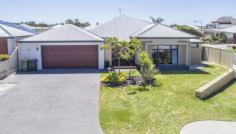  13 Wentworth Loop Dunsborough WA 6281 $639,000 THE NAUTILUS' BY DALE ALCOCK This big family home is perfectly positioned with a feature park a stones' throw away and the 16th tee of the Dunsborough Lakes golf course just a 200m stroll away. On an elevated 667sqm block, the home consists of four big bedrooms, two bathrooms, study/fifth bedroom, large separate theatre room and huge open plan living. The large open plan living has high ceilings throughout is perfect to take in the winter sun and maximise all the natural lighting the home offers. The kitchen has everything the aspiring chefs requires with quality stainless steel appliances, 5 burner gas cooktop, electric oven, rangehood and dishwasher, stone bench tops, breakfast bar, double sink, soft close drawers and cupboards finish off and compliment the area perfectly. All bedrooms are big with the master having a huge walk in robe, ensuite with his/her vanities and shower heads while one minor bedroom has a walk in robe and the other two with double built ins.  North facing decked alfresco with high pitched ceilings makes this perfect for those who love outdoor entertaining. The double garage is extra sized with space for the man who wants his work station plus it has a rear roller door which is perfect for boats, jet skis and trailers. Call today for a viewing! 