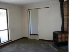  35 Pensioner Rd Kojonup WA 6395 $265,000 Blank Canvas House - Property ID: 913551 This property allows you to fit it out how you would like your new home to look. The formal lounge is at the front of the home and has a slow combustion wood fire.  A doorway of the lounge takes you into the kitchen dining area. The three bedrooms come off the central passage along with the laundry and bathroom.  In the bathroom there is a separate bath and shower. The toilet is located in the laundry. The back yard is well fenced and has a garage in the right-hand corner that is accessed down the side of the home. If you are looking for a double brick and tile home in a good location that you can add your touch to the have a look at this property.   Print Brochure Email Alerts Features  Land Size Approx. - 810 m2  Close to Schools  Close to Shops  Close to Transport  Fireplace(s)  Formal Lounge 