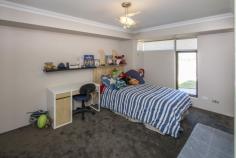  13 Wentworth Loop Dunsborough WA 6281 $639,000 THE NAUTILUS' BY DALE ALCOCK This big family home is perfectly positioned with a feature park a stones' throw away and the 16th tee of the Dunsborough Lakes golf course just a 200m stroll away. On an elevated 667sqm block, the home consists of four big bedrooms, two bathrooms, study/fifth bedroom, large separate theatre room and huge open plan living. The large open plan living has high ceilings throughout is perfect to take in the winter sun and maximise all the natural lighting the home offers. The kitchen has everything the aspiring chefs requires with quality stainless steel appliances, 5 burner gas cooktop, electric oven, rangehood and dishwasher, stone bench tops, breakfast bar, double sink, soft close drawers and cupboards finish off and compliment the area perfectly. All bedrooms are big with the master having a huge walk in robe, ensuite with his/her vanities and shower heads while one minor bedroom has a walk in robe and the other two with double built ins.  North facing decked alfresco with high pitched ceilings makes this perfect for those who love outdoor entertaining. The double garage is extra sized with space for the man who wants his work station plus it has a rear roller door which is perfect for boats, jet skis and trailers. Call today for a viewing! 
