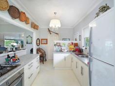  3 Gosford St Point Clare NSW 2250 Country Style by the Water Desirably located on Noonan Point, the water side of Point Clare railway station, this delightful home is sure to appeal. Currently configured as a chic, 2 bedroom country style cottage, and a 1 bedroom, self-contained income suite, this property will appeal to home owners and investors alike. The main dwelling has an open plan living space that flows freely outdoors to the entertainment deck that affords lovely views across the water, as does the spacious bedroom of the suite, which of course could be the master bedroom, if brought back into one house for owner use. With so much possibility, this home is sure to attract immediate attention. Land Size 480m2 Rates $1594 