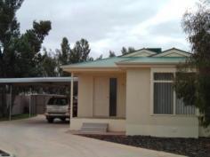  20/30 Burgoyne Street Roxby Downs SA 5725 $180 per week 3 BEDROOM HOME Property ID: 7168328 This is a very neat & tidy 3 bedroom home in the Dunes Estate. It features an open plan kitchen, living & dining areas, ducted heating & cooling through to a large rear verandah to enjoy those warm nights. 