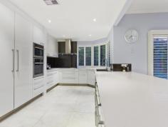  19 Deverall Square Hillarys WA 6025 $1,100,000 - $1,200,000 ALL OFFERS PRESENTED AT 4PM ON MONDAY 6 FEBRUARY (unless sold prior) Grand two storey family home set in an elevated and peaceful Hillarys location and sought after cul de sac nestled amongst other quality homes. With its spacious and luxurious living plus a stunning resort style Alfresco and pool area, this beautiful home is sure to impress! Ideally located with almost everything you need very close by including an easy walk to Whitfords shopping centre and St. Mark's Anglican School (without even needing to cross a road) also in close proximity to public transport, parks and magnificent beaches. - 	 Double front doors lead to tiled entrance extending through to the main living area - 	 Study is conveniently accessed from the foyer and has views into the tranquil front yard - 	 Formal dining or lounge (the choice is yours) off the foyer - 	 The heart of the home comprises of a light and spacious open plan kitchen, family room and meals opening out to the Alfresco for the ideal indoor outdoor lifestyle - 	 Games/theatre room is located off the main living area through double French doors and has an internal window making it easy to keep an eye on the kids! - 	 Family dinners and entertaining will be a breeze in the crisp and modern white chef's kitchen with large bench space, modern European appliances, double pantry and heaps of cupboards - 	 Three double bedrooms downstairs all with built in robes - 	 Family bathroom with dual access to the largest of the three downstairs bedrooms, ideal for guests or a lucky teenager - 	 Large laundry with fitted cupboards - 	 Upstairs parents retreat includes a lounge with access to a generous private covered balcony offering sensational sunsets and views of the Indian ocean, Rottnest and the Rottnest lighthouse in the evenings. Impressive master bedroom with a large fitted walk-in robe, attractive well-appointed ensuite with double basins and shower as well as a free-standing tub. - 	 The timber decked Alfresco and Bali hut overlook the sparkling pool - 	 Easy-care reticulated lawn and gardens - 	 Awesome cubby house for children to enjoy which includes a DVD -TV and play area underneath. - 	 Double automatic garage with direct access into the house and backyard, additional workshop/storage area plus fold away stairs into the roof space Additional features: - 	 Bright white Plantation shutters throughout giving it a Hamptons feel - 	 Ducted reverse cycle a/c downstairs plus split units in all the bedrooms and upstairs lounge - 	 10 Solar panels - 	 Ample storage including roof area with floorboards for extra storage - 	 Linen press - 	 Recently painted and fully renovated with many of the fittings still under warranty  With its combination of grandeur and practicality, situated in the heart of one of Perth's best coastal suburbs, this is a home not to be missed! 