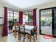  14 Sugar Gum Ct Jimboomba QLD 4280 $599,000 OMG – How Good Is This ! An outstanding opportunity to secure this substantial family home, surrounded by mature gardens, with the pool, the spacious outdoor entertainment area and an equally impressive shed already in place. With wide frontage and an electric gate at each end of the semi-circular driveway, your 1st impression will be a good one and it just keeps getting better, as you begin to see more of this well presented property. Large living spaces and ducted air-conditioning await your inspection, with the carpeted formal lounge set away from the rest, leading through to the spacious family room, with feature combustion heater in the corner, the dining area off and then on through twin 10 panel glass doors to the huge rumpus beyond. The hub of the home is the kitchen and once again it’s good news, with gas cooking, an electric oven and abundant high and low line cupboards, with heaps of bench space and a corner pantry included for good measure and the fridge space is excellent, enough for a matched fridge / freezer set. Bedrooms – more good news ! The master bedroom, set away from the rest is simply huge as you may be able to tell from our images. The next big surprise is the walk-in robe, which is also huge, so wardrobe space is unlikely to be an issue, and in keeping with everything else, the en-suite is also well appointed with both a corner Spa bath and a shower in this very spacious room. Bedroom 5 or the Study, is once again spacious and this theme continues through the other bedrooms, each of which has a large double built-in robe and ranges in size from large to extra-large. If you have been looking for a large family home with big bedrooms, then this is most definitely THE ONE ! Moving outside, you can all kick back and relax with your family and friends in the substantial outdoor entertainment area which also includes a built-in Bar and all of this is perfectly positioned, overlooking that sparkling (and I DO mean sparkling) in ground salt pool with cascade water feature, all of which combines to deliver a private and inviting outdoor entertaining experience with a genuine feel good factor. Moving beyond the pool and entertainment area, you’ll find a play area for the kids, before you reach the substantial shed, properly setup with its own safety switch and abundant power and lighting as you might expect. The mature gardens that I mentioned earlier have a real WOW Factor (which our photographer confirmed !) as you may be able to tell from our images, with a myriad of natives, fruit trees and shrubs delivering both privacy and interest, all of which have been established with low maintenance in mind; our owners appreciate the natural beauty that they created but did not want to be slaves to yard maintenance ! For those not familiar with the local area, Jimboomba Township is just a few minutes away, while Browns Plains is a 20 minute drive and Brisbane CBD is yours within the hour. The GOLD Coast too is similarly accessible and you’ll also find a wide range of sporting, recreational and educational facilities all close at hand. So if you have been searching in vain for that almost mythical large family home, on a stunningly beautiful block, with large living areas, big bedrooms, the pool, the outdoor entertainment area and the shed, then you really can’t afford to miss this one. An early inspection is MOST DEFINITELY recommended … Property Details Elders Property ID: 11181532 5 bedrooms 2 bathrooms 5 car parks Land Area 4353 square metres 5 car garage 