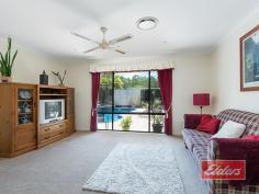  14 Sugar Gum Ct Jimboomba QLD 4280 $599,000 OMG – How Good Is This ! An outstanding opportunity to secure this substantial family home, surrounded by mature gardens, with the pool, the spacious outdoor entertainment area and an equally impressive shed already in place. With wide frontage and an electric gate at each end of the semi-circular driveway, your 1st impression will be a good one and it just keeps getting better, as you begin to see more of this well presented property. Large living spaces and ducted air-conditioning await your inspection, with the carpeted formal lounge set away from the rest, leading through to the spacious family room, with feature combustion heater in the corner, the dining area off and then on through twin 10 panel glass doors to the huge rumpus beyond. The hub of the home is the kitchen and once again it’s good news, with gas cooking, an electric oven and abundant high and low line cupboards, with heaps of bench space and a corner pantry included for good measure and the fridge space is excellent, enough for a matched fridge / freezer set. Bedrooms – more good news ! The master bedroom, set away from the rest is simply huge as you may be able to tell from our images. The next big surprise is the walk-in robe, which is also huge, so wardrobe space is unlikely to be an issue, and in keeping with everything else, the en-suite is also well appointed with both a corner Spa bath and a shower in this very spacious room. Bedroom 5 or the Study, is once again spacious and this theme continues through the other bedrooms, each of which has a large double built-in robe and ranges in size from large to extra-large. If you have been looking for a large family home with big bedrooms, then this is most definitely THE ONE ! Moving outside, you can all kick back and relax with your family and friends in the substantial outdoor entertainment area which also includes a built-in Bar and all of this is perfectly positioned, overlooking that sparkling (and I DO mean sparkling) in ground salt pool with cascade water feature, all of which combines to deliver a private and inviting outdoor entertaining experience with a genuine feel good factor. Moving beyond the pool and entertainment area, you’ll find a play area for the kids, before you reach the substantial shed, properly setup with its own safety switch and abundant power and lighting as you might expect. The mature gardens that I mentioned earlier have a real WOW Factor (which our photographer confirmed !) as you may be able to tell from our images, with a myriad of natives, fruit trees and shrubs delivering both privacy and interest, all of which have been established with low maintenance in mind; our owners appreciate the natural beauty that they created but did not want to be slaves to yard maintenance ! For those not familiar with the local area, Jimboomba Township is just a few minutes away, while Browns Plains is a 20 minute drive and Brisbane CBD is yours within the hour. The GOLD Coast too is similarly accessible and you’ll also find a wide range of sporting, recreational and educational facilities all close at hand. So if you have been searching in vain for that almost mythical large family home, on a stunningly beautiful block, with large living areas, big bedrooms, the pool, the outdoor entertainment area and the shed, then you really can’t afford to miss this one. An early inspection is MOST DEFINITELY recommended … Property Details Elders Property ID: 11181532 5 bedrooms 2 bathrooms 5 car parks Land Area 4353 square metres 5 car garage 