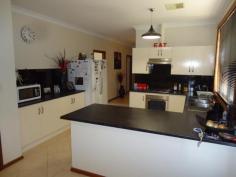  2 Holze Court Port Pirie SA 5540 $439,000  SUPERB STONE FRONTED FAMILY HOME!! This one owner built home is an absolute beauty. Hand picked Margaret River Limestone from WA to the front of the home is a unique feature to complement the quality of this stunning home. The home of approximately 5 years old presents as 4 big bedrooms with the main featuring a walk-in robe and large ensuite while the other 3 bedrooms provide quality built-in robes. The living areas are very generous in size with a formal lounge to the front and a beautiful big tiled family room to the rear of the home. The dining area adjoins the sparkling tiled kitchen complete with walk-in pantry, stainless steel appliances including an under bench oven, gas cooktop, rangehood and breakfast bar. The beautifully appointed 3 way tiled bathroom is also large and includes a powder room, separate shower, bath and toilet. Other features of this superb home include 9 foot ceilings throughout, ducted, reverse cycle, refrigerated air-conditioning for all year round comfort and a large tiled laundry.  Externally, the home is situated on a rare 5,047 sqm allotment which provides a garage under the main roof with electronic rollerdoor, large double colourbond shed with concrete floor, quality aluminium windows, bull-nose verandah to the front, established trees on watering systems plus much more all located on a corner block close to the golf course, St. Marks Private Schools and set amongst other top quality homes. A must see!! PROPERTY DETAILS $439,000  ID: 394155 Land Area: 5047 m² 