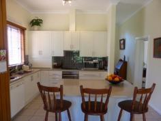  28 Gap St Parkes NSW 2870 $420,000 You'll Just Love Living Here This home home has so much going for it, when you talk position you talk 28 Gap Street, short stroll to the main street, walking distance to three schools, side lane access to a double garage and beautiful landscaped gardens. The home has ducted evaporative a/c, natural gas heating, three spacious bedrooms plus a fourth bedroom or office, large lounge room plus a modern kitchen and magnificent sun room that looks out to a beautiful vine covered entertaining area. The yard is secure and there is another entertaining area off the double garage plus an underground cellar. DETAILS ID #: 0000330282 Price: $420,000 Type: House Bed: 3    Bath: 2    Car: 2     Land Area: 1012 sqm (approx) 